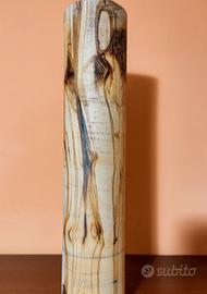 tronco di legno d'ulivo tornito