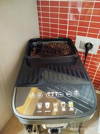 macchina caffè DeLonghi magnifica evo