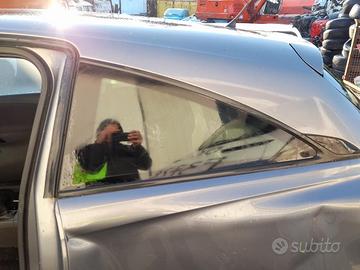 CRISTALLO FISSO PARAFANGO POST. SX. OPEL CORSA «E»