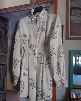 Camicetta o mini vestito.