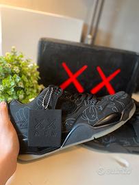 Air Jordan 4 Retro x KAWS Black – Taglia 43