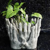 Vaso mani intrecciate