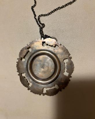 Medaglione capoculla in argento 800