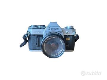 Canon AT-1 + 3 obiettivi (28 mm, 50 mm, 135 mm)