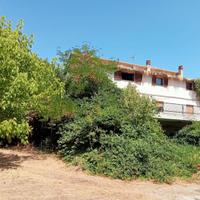 Casa indipendente e locale commerciale