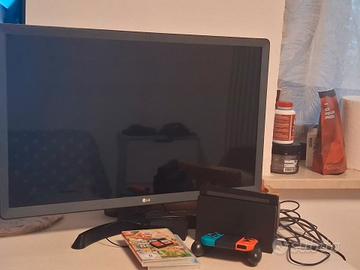 nintendo switch con 4 giochi, tv 24 pollici 