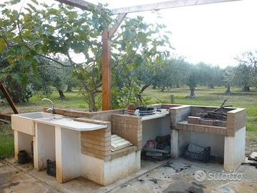 Terreno a frutteto con pozzo barbecue piattaforma