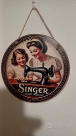 Singer insegna pubblicitaria 