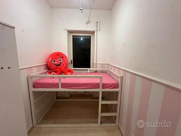 Letto Kura Ikea reversibile bianco con materasso