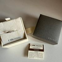 Anello oro bianco e zirconi