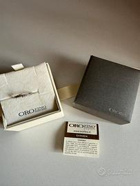 Anello oro bianco e zirconi