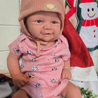 Reborn bambola  e seggiolone 130 euro