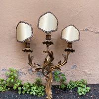 Applique in legno dorato