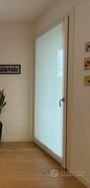 Tenda a vetro per porta finestra