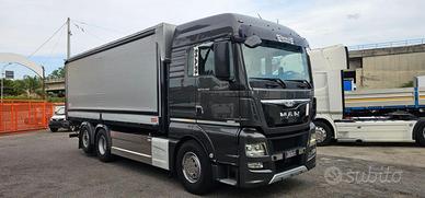 MAN TGX26.560 CENTINATO ALZA E BASSA+SPONDA RETA
