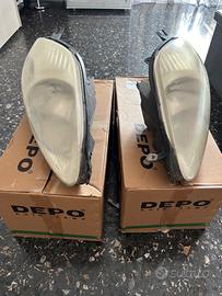 Coppia fari anteriori grande punto