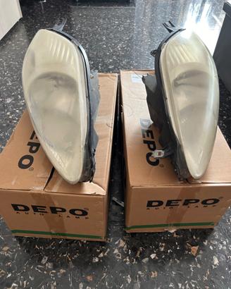 Coppia fari anteriori grande punto