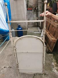 lettino vintage in ferro battuto