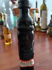 bottiglietta mignon raffigurante totem sudamerican
