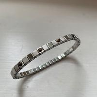 Bracciale a maglie elastico in metallo