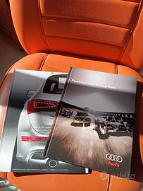 Libro più rivista magazine marchio Audi 
