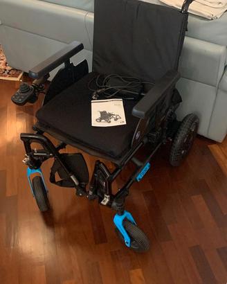 Sedia a rotelle elettrica
