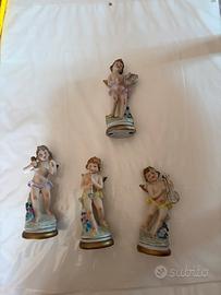 Set 4 putti musicanti in porcellana vintage