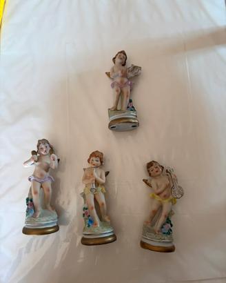 Set 4 putti musicanti in porcellana vintage