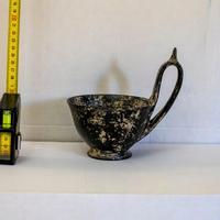 riproduzione artistica di Kyathos Etrusco in bucch