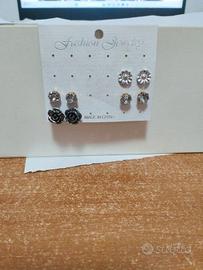 Orecchini 4 paia punto luce e fiore