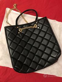 borsa la fille des fleur nera trapuntata catena or