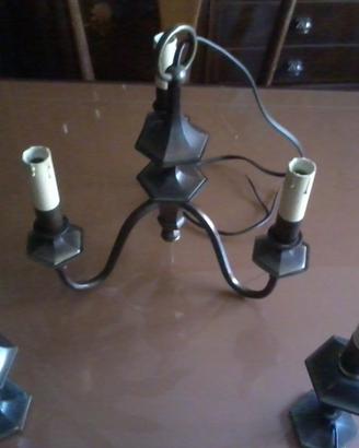 Lampadario e lumicini in ottone