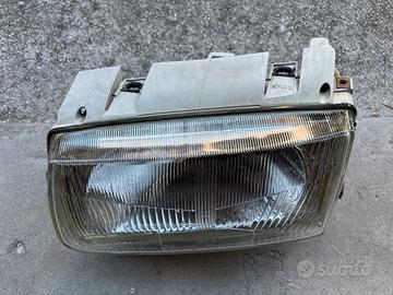 VW Polo Mk3 1994: faro anteriore SINISTRO – HELLA