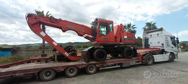 Escavatore gommato Colmar