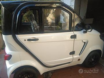 scooter elettrico cabinato per disabili