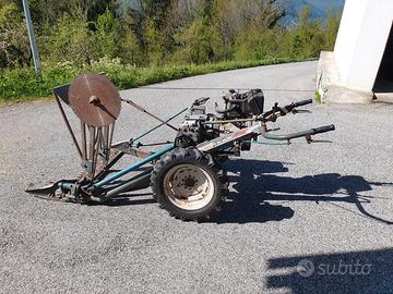 falciatrice con sega circolare e carrello