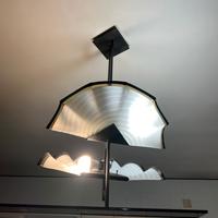 Lampadario moderno in vetro e metallo