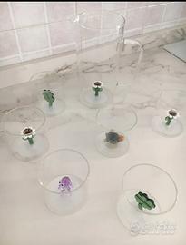 Set di sei bicchieri in vetro soffiato e caraffa