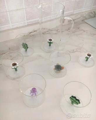 Set di sei bicchieri in vetro soffiato e caraffa