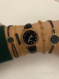 Orologio nero con bracciali