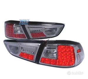 FANALI MITSUBISHI LANCER SEDAN 08- LED FONDO CROMA