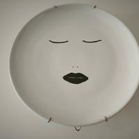 piatti di design "Kiasmo" in ceramica con supporti