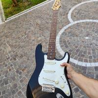Chitarra elettrica e acustica con stand