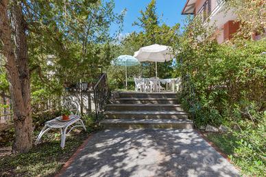 Elba marina di campo p t 7-9 ospiti con giardino