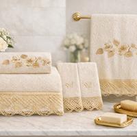 Asciugamani in cotone nuovi e ricamati a mano