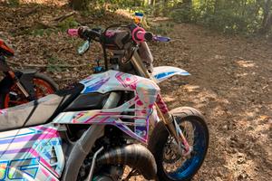 TM 125