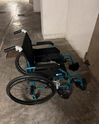 Carrozzina per persone con disabilità