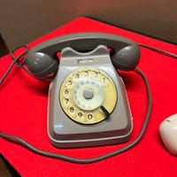 Telefono Italtel grigio a disco