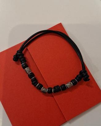 Bracciale Dodo granelli neri e borchie titanio