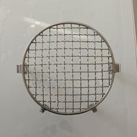 griglia faro Triumph scrambler 